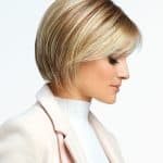 Short blonde wig with layered style for a classic, cool look.