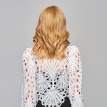 Wavy blonde wig displayed from the back, showcasing natural curls and volume.