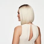 Blonde bob wig styled on a woman with side profile view.
