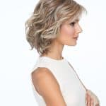 Short wavy blonde wig styled for a natural look.