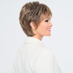 Short layered wig with blonde highlights and textured style.