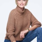 Short blonde wig styled with a casual outfit for a fashionable look.