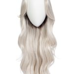 Blonde wavy wig displayed on a mannequin head with no face.