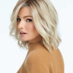 Blonde wavy wig styled for a natural look, perfect for everyday wear or special occasions.