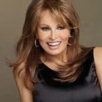Beautiful woman with auburn wavy wig, perfect for stylish looks.