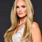 Beautiful blonde wig with long, straight hair for a natural and elegant appearance.