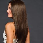 Long straight brown wig with a natural shine and smooth texture.