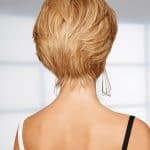 Short blonde wig styled for a professional look, perfect for success stories.