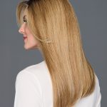 Long, straight blonde wig with layered ends, perfect for elegant looks.