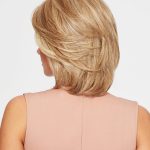 Blonde layered wig styled for a natural look for women.
