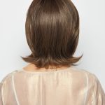 Short brown wig with layered style for a natural look.