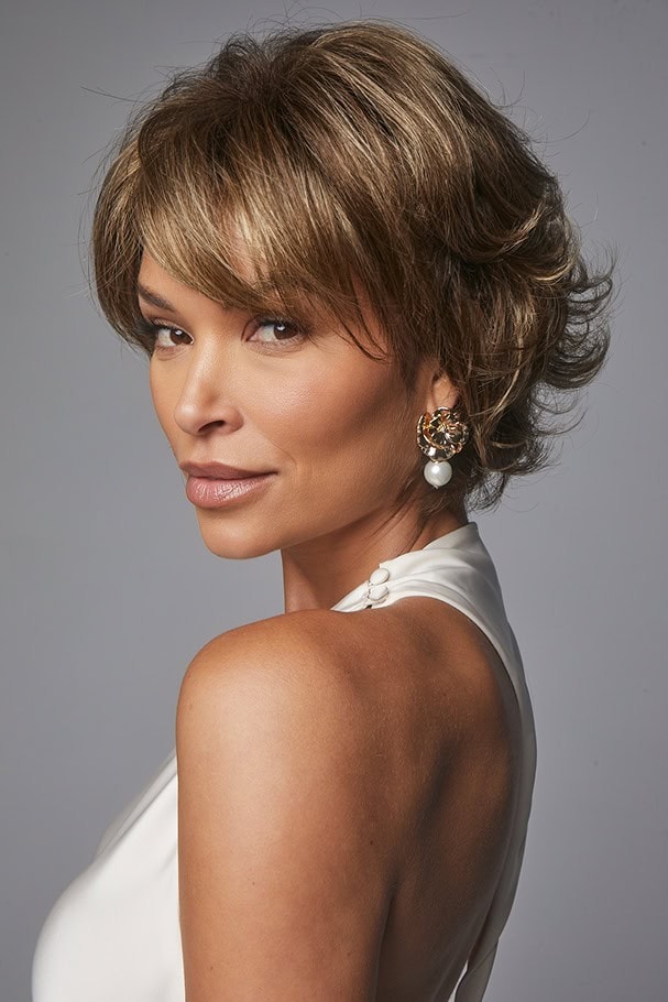 Woman with short layered brown wig, elegant look, Hidden Secrets Wigs.