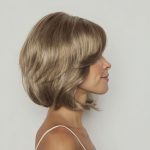 Blonde bob wig styled in a layered, natural look for women.