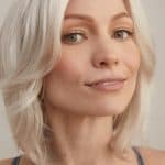 Blonde wig with soft waves, natural look, for elegant style.