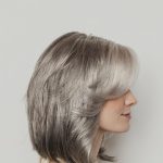 Elegant silver wig with layered style from Hidden Secrets Wigs.