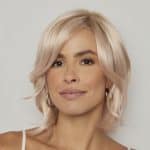 Blonde layered wig with soft waves, perfect for elegant looks.