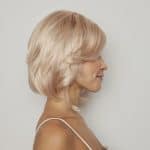 Blonde short wig with layered waves from Hidden Secrets Wigs.