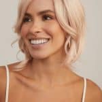 Blonde wavy wig from Hidden Secrets Wigs, Sheena style, for a natural look.