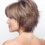 Stylish short layered wig in light brown with blonde highlights.