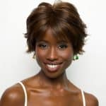 Short curly wig for women, natural brown color, stylish and versatile.