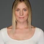 Wavy 14-inch blonde wig from Hidden Secrets Wigs for a natural look.