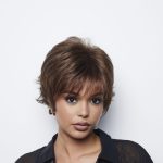 Short brown wig styled on a woman with a black shirt, perfect for fashion and everyday wear.