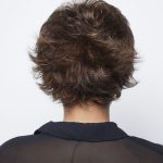 Curly short wig in brown shades for stylish hair transformation.