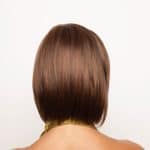 Back view of a short, straight, chestnut brown wig from the Wynn Noriko Collection.
