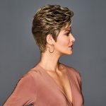 Short textured wig with layered styling and highlights for women.