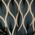 Close-up of a black and beige wig with intricate geometric pattern.