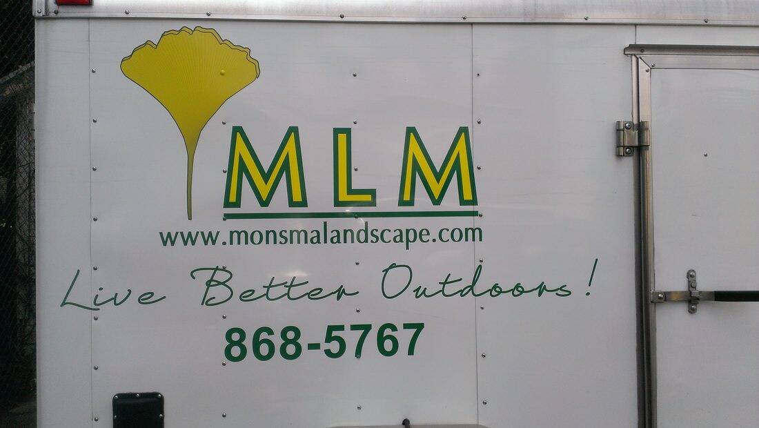 Vehicle wrap for Handicap Sign Inc. featuring company logo and contact info.
