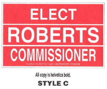 Political campaign sign for Elect Roberts as Commissioner with bold red and white design.