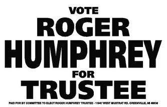Political campaign sign for Roger Humphrey trustee candidate.