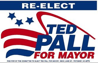 Campaign logo for Ted Pall for Mayor with American flag and stars.