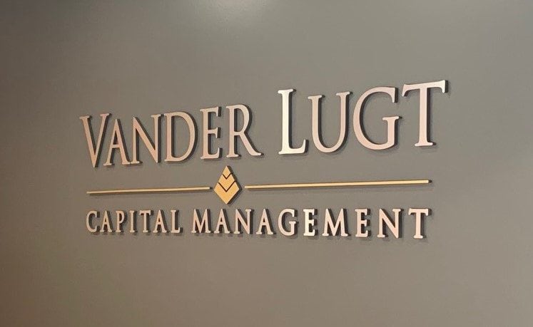 Vander Lugt Capital Management office sign on wall.