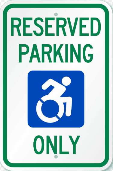 Reserved parking sign for handicapped accessible spaces only.