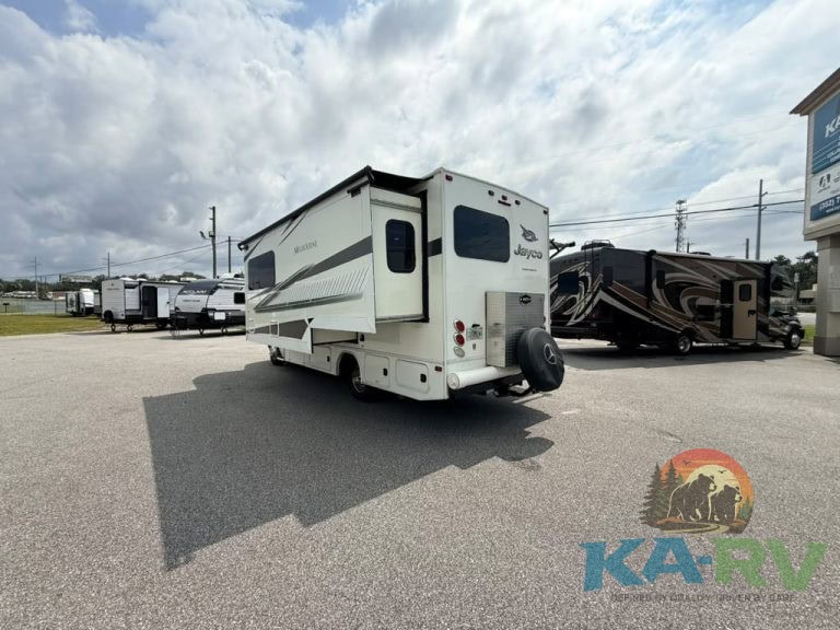White Jayco RV with slide-out parked at Karv Repair lot.