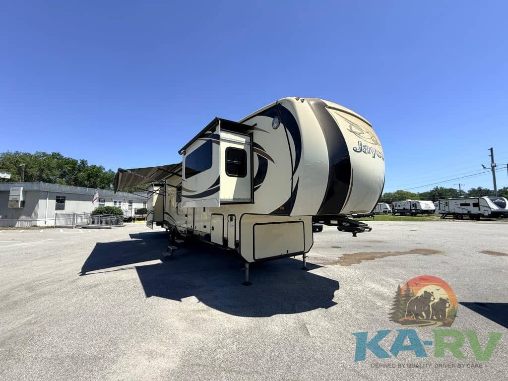 Luxury RV trailer at a repair lot, ready for maintenance or service.