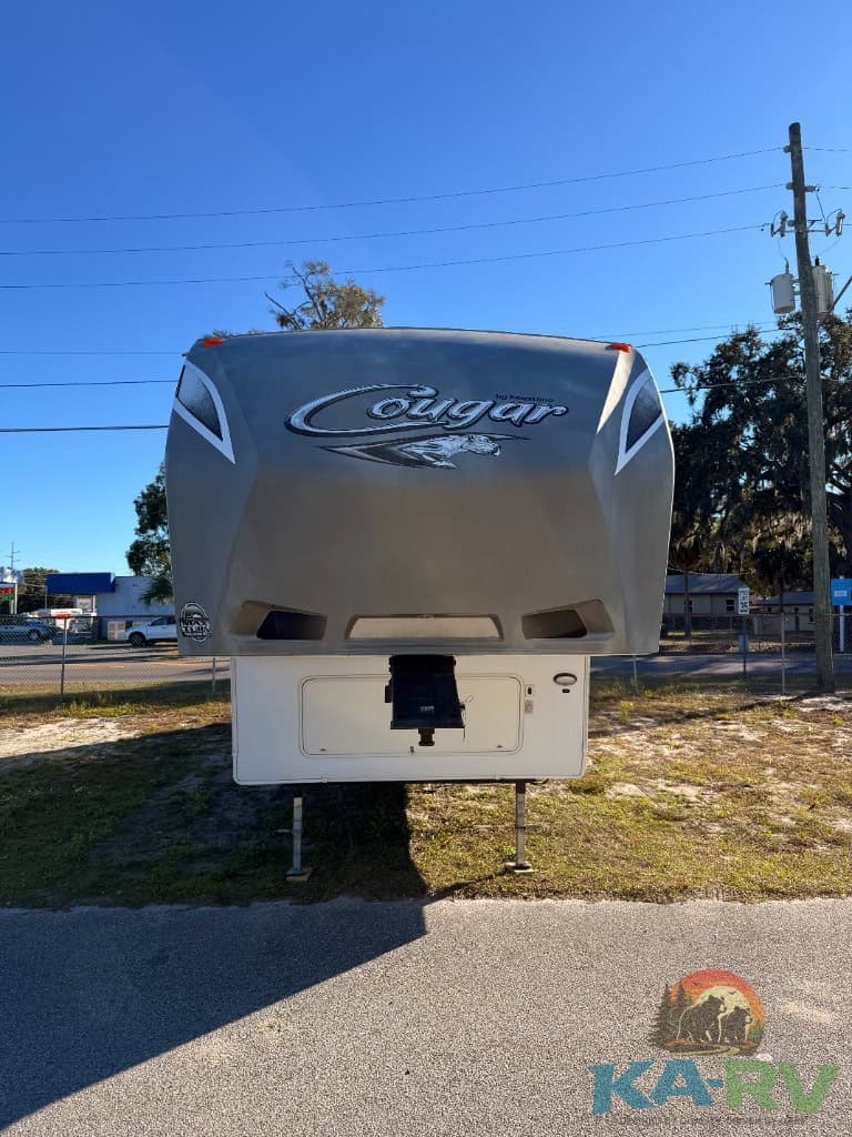 Front view of Keystone Cougar RV for repair services.