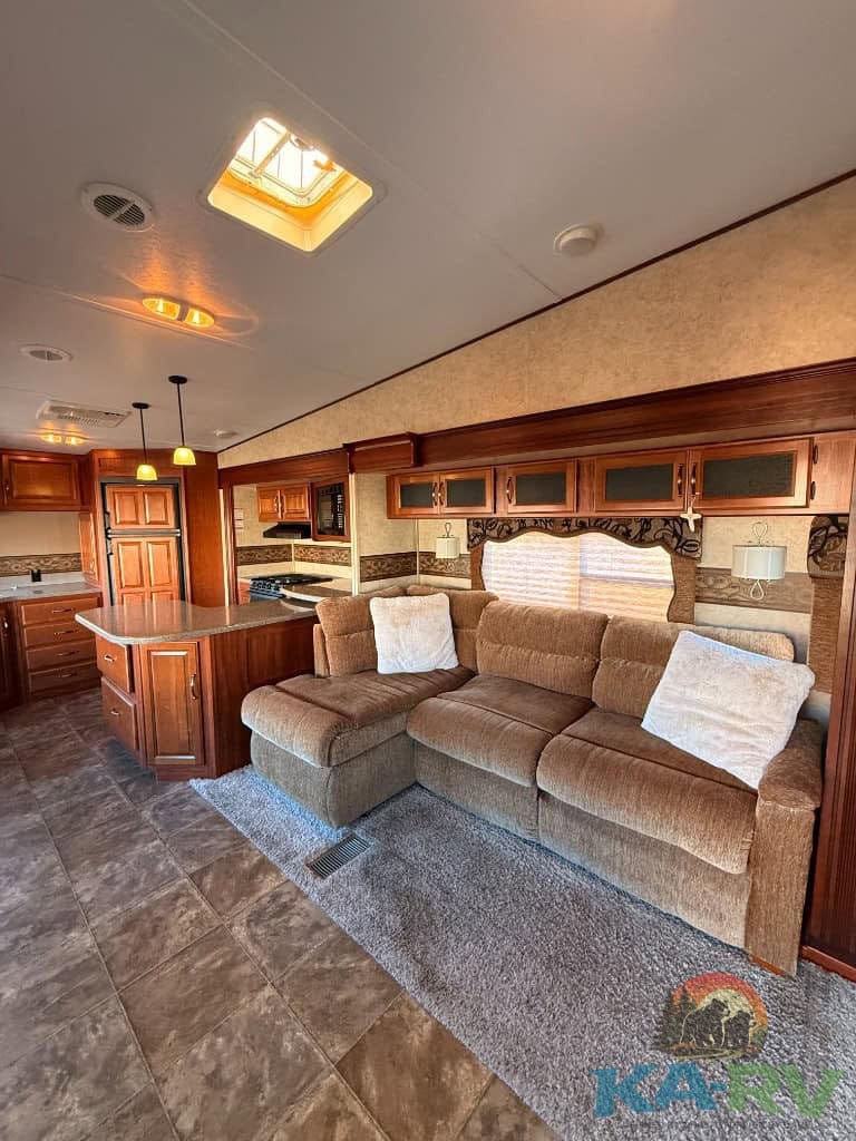 RV interior with cozy sofa and ample storage for optimal travel comfort.