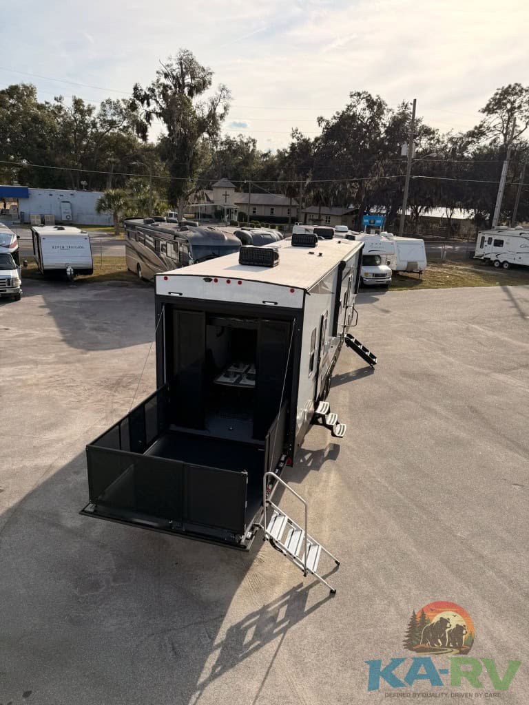 Modern Dutchmen Voltage 3800 RV with outdoor amenities.