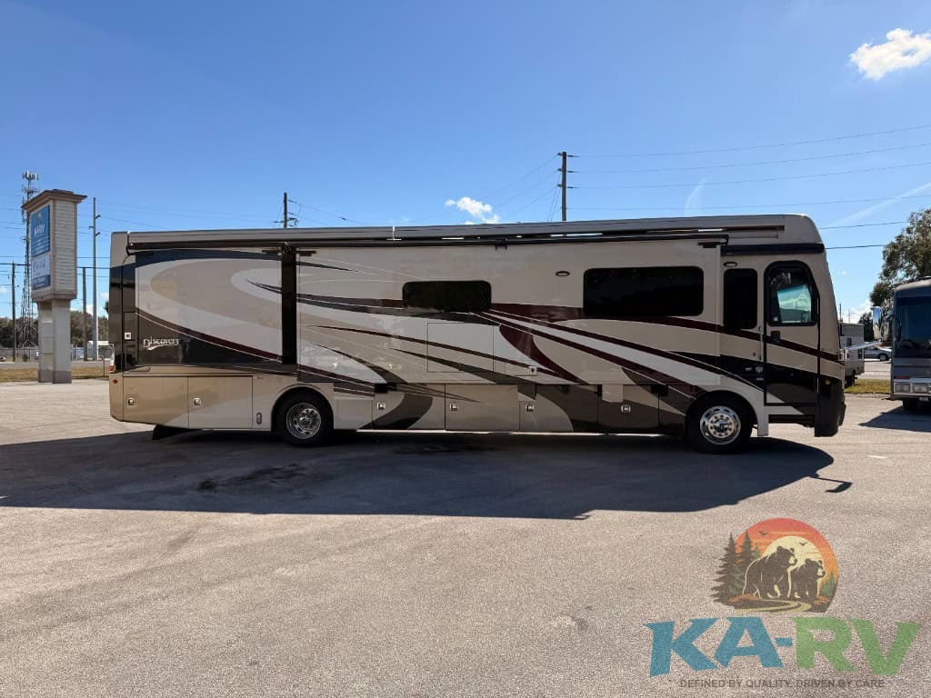 High-quality image of a 2018 Fleetwood Discovery 39F motorhome parked outdoors.