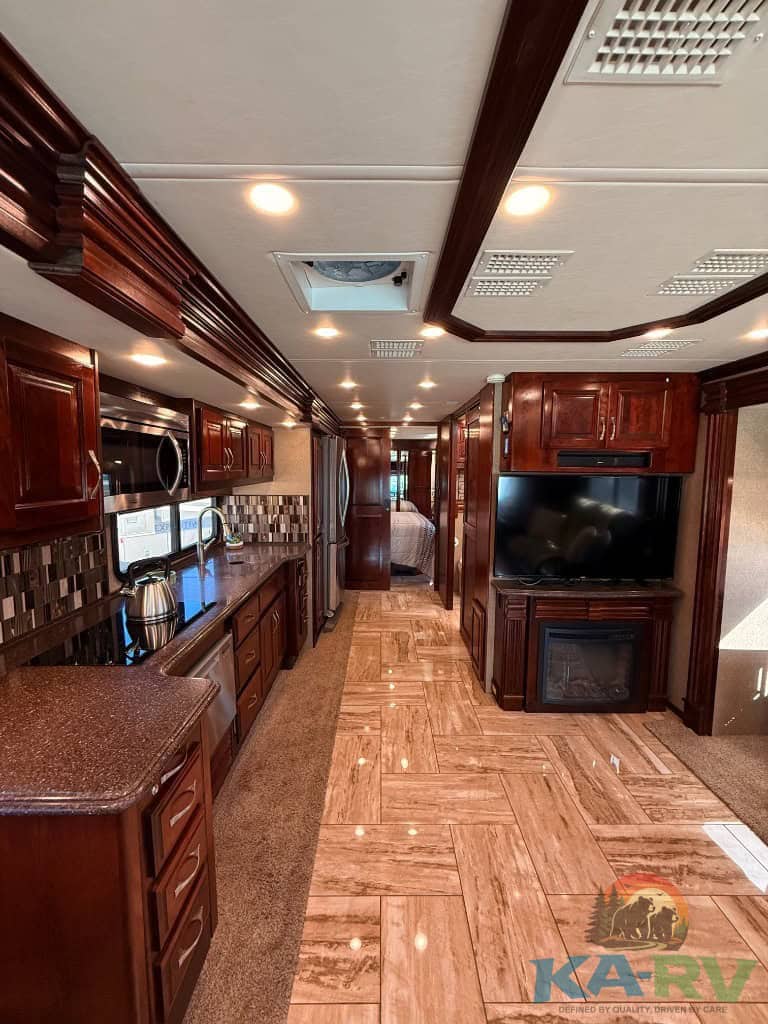 High-quality ALT tag showcasing the elegant interior of a 2018 Fleetwood Discovery 39F RV, emphasizi.