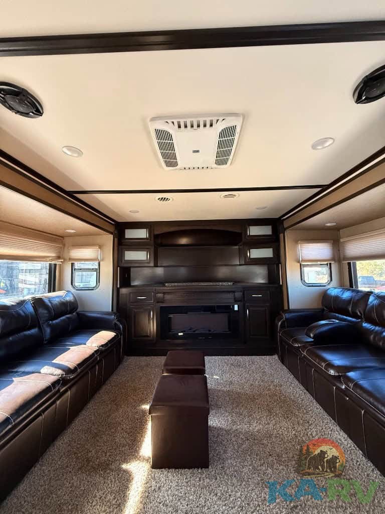 RV ceiling with air conditioning unit and recessed lighting for optimal comfort.