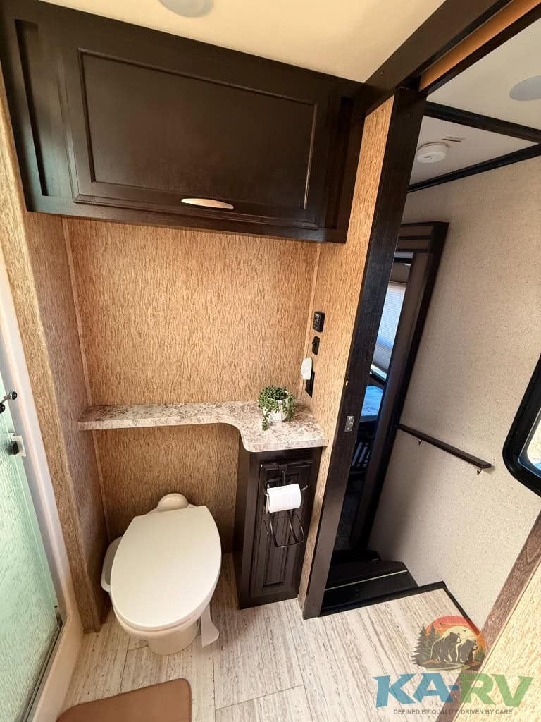 Bathroom interior of a 2017 Grand Design Momentum RV.