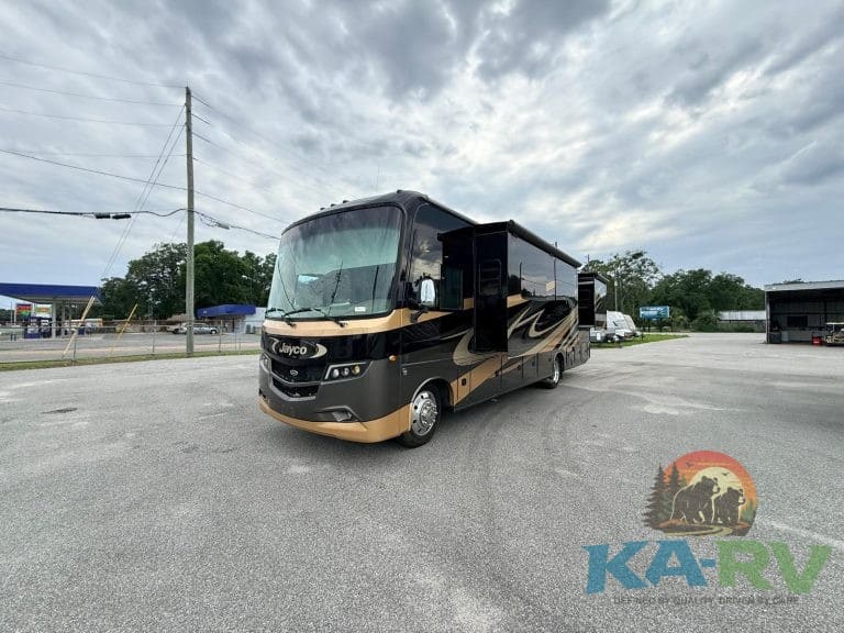 Modern Jayco RV motorhome parked outdoors, ideal for Optima RV travel and camping needs.
