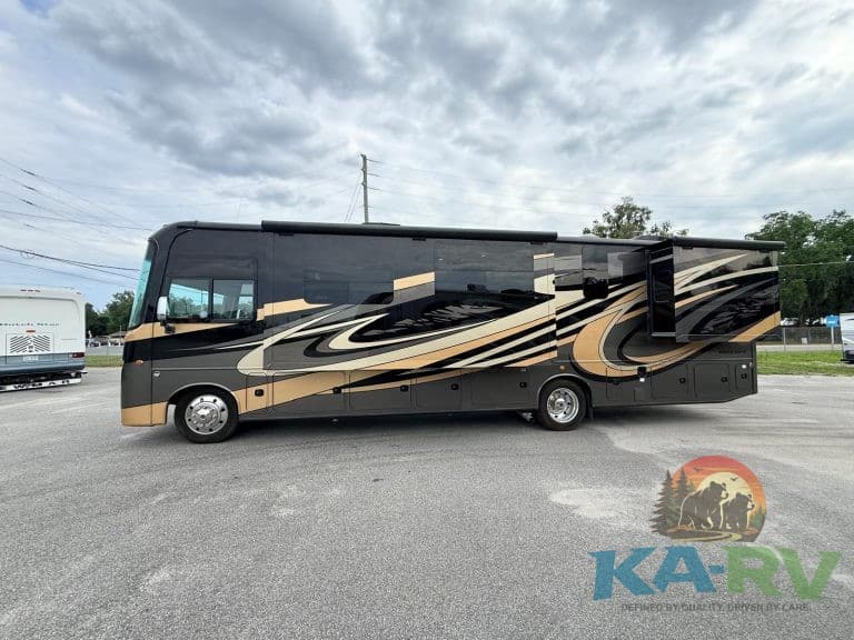 Luxury RV with sleek black and gold design, perfect for travel and camping needs.