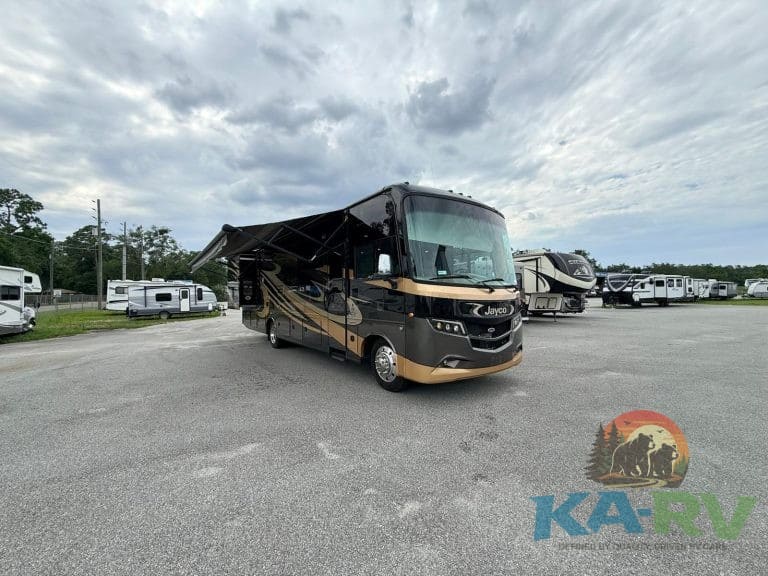 Luxury Class A RV motorhome parked at KA RV Repair lot, showcasing expert RV repair services for Opt.