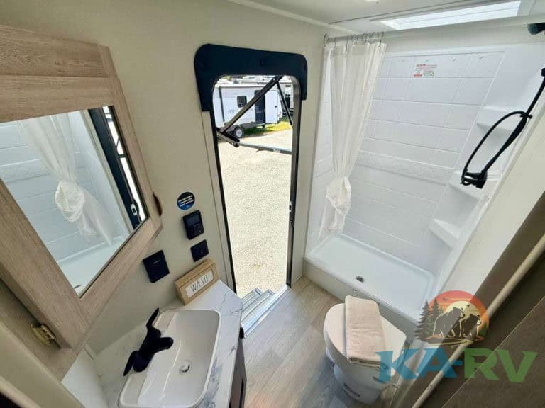 RV bathroom and shower area inside the 2026 Acclaim 2700BH model.