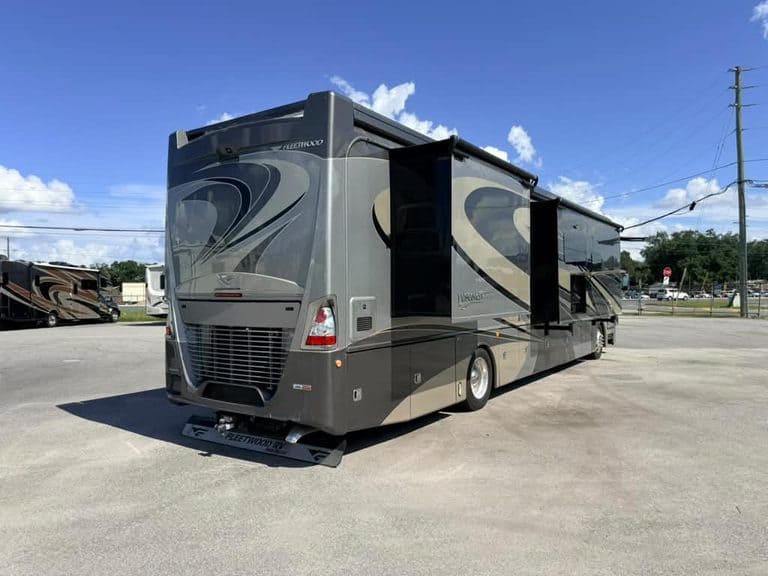 Luxury 2018 Fleetwood Discovery RV parked outdoors for repair.